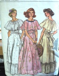 9731 VOG RUFFLE OR NOT TIE FLR FLARE DRESS,CAPELET PATTERN 6,12